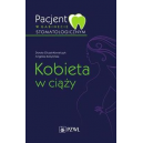 Kobieta w ciąży pacjent w gabinecie stomatologicznym